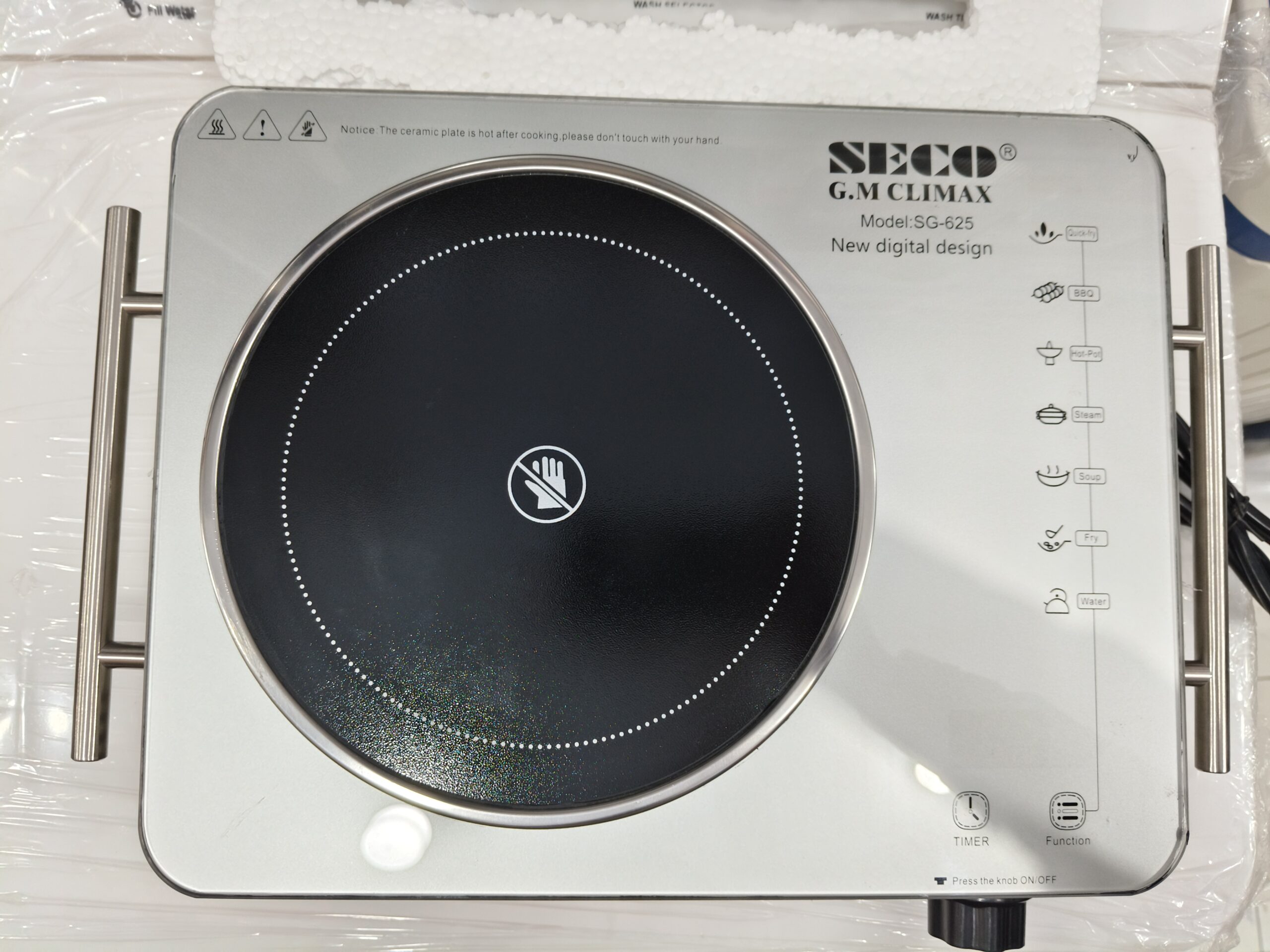 A sleek SECO Electric Hot Plate with a stainless steel body and double infrared burners on a white background.